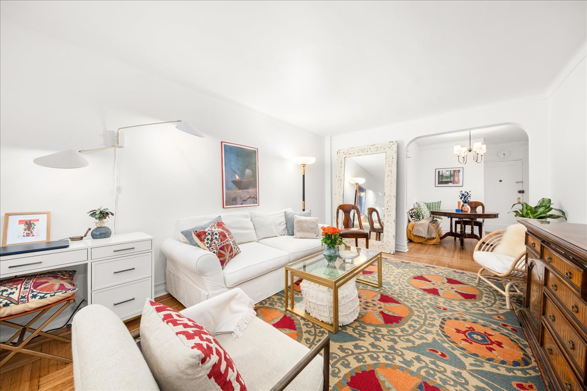 360 Clinton Avenue, Unit 1D Brooklyn, NY 11238 - Photo 5 of 17 a living room with furniture and wooden floor