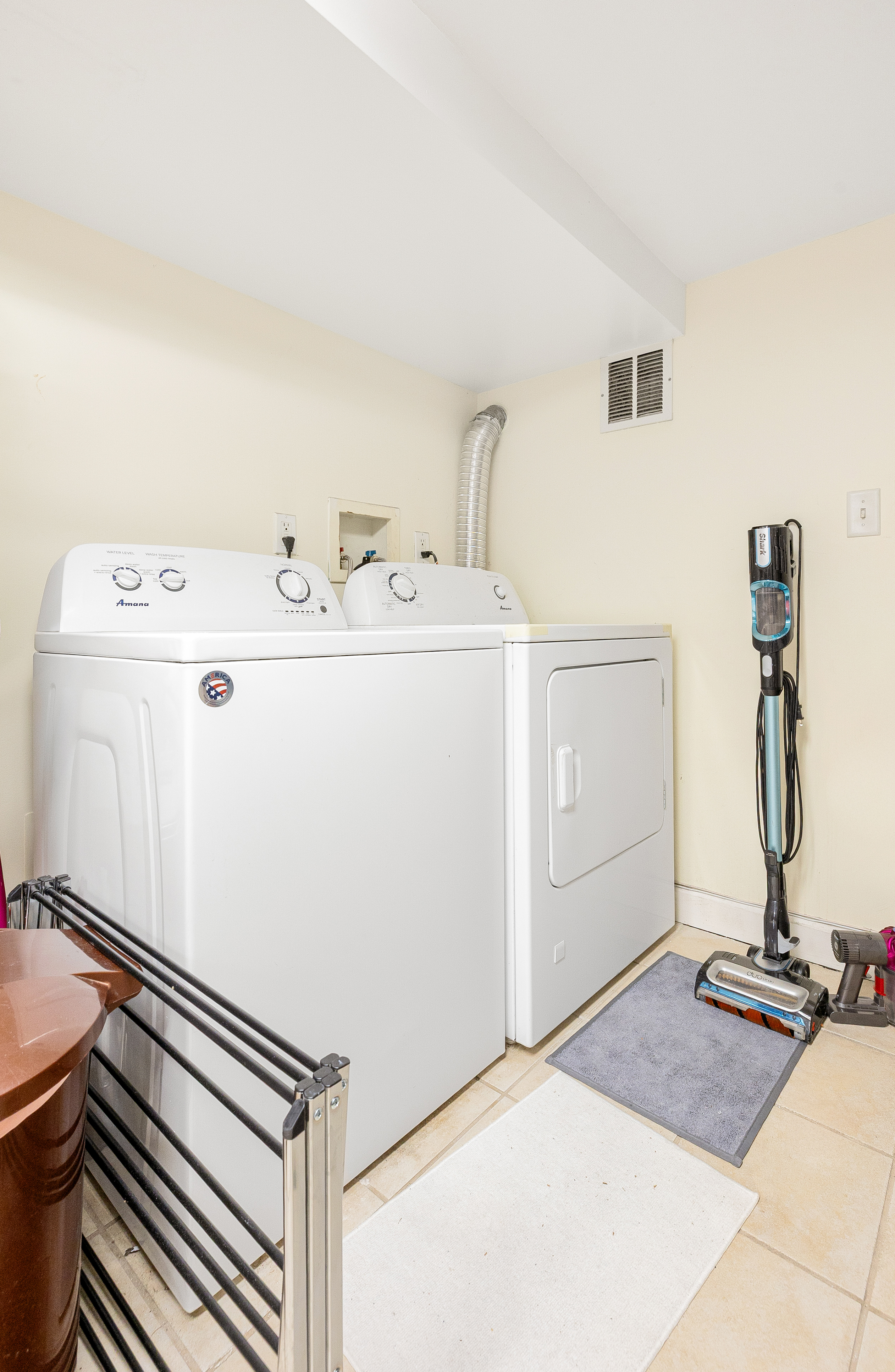 518 West 149th Street Manhattan, NY 10031 - Photo 13 of 23 a utility room with dryer and washer