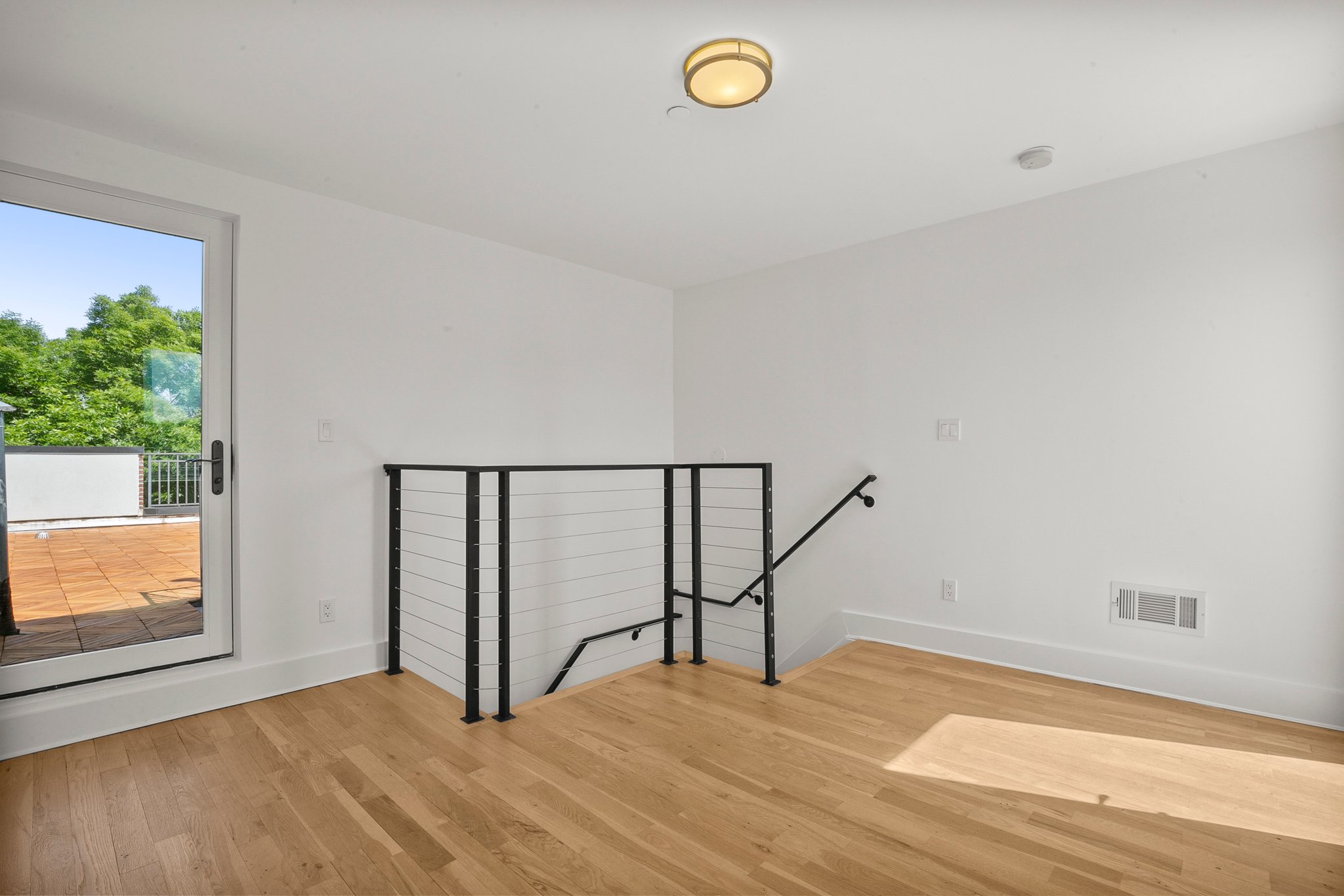 1130 Decatur Street Brooklyn, NY 11207 - Photo 10 of 24 a view of entryway with wooden floor