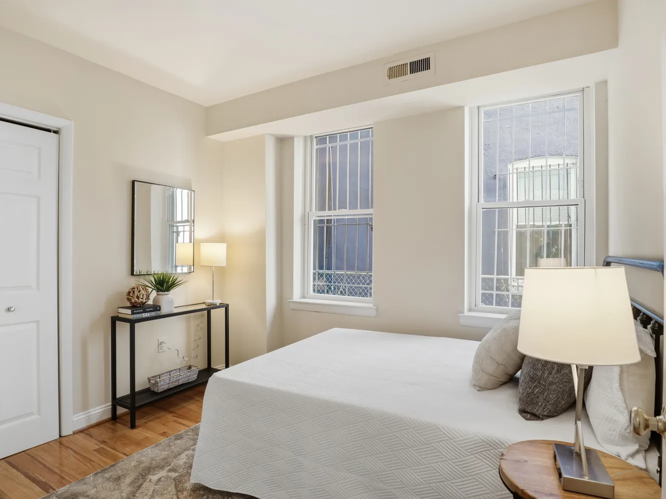 a bedroom with a bed and window