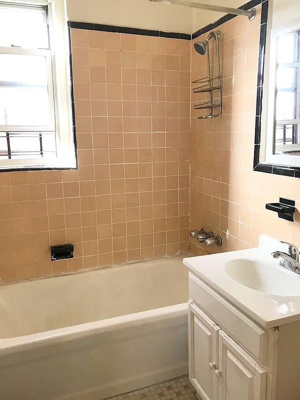 100 Avenue P, Unit 6D Brooklyn, NY 11204 - Photo 4 of 4 a bathroom with a sink and a bathtub