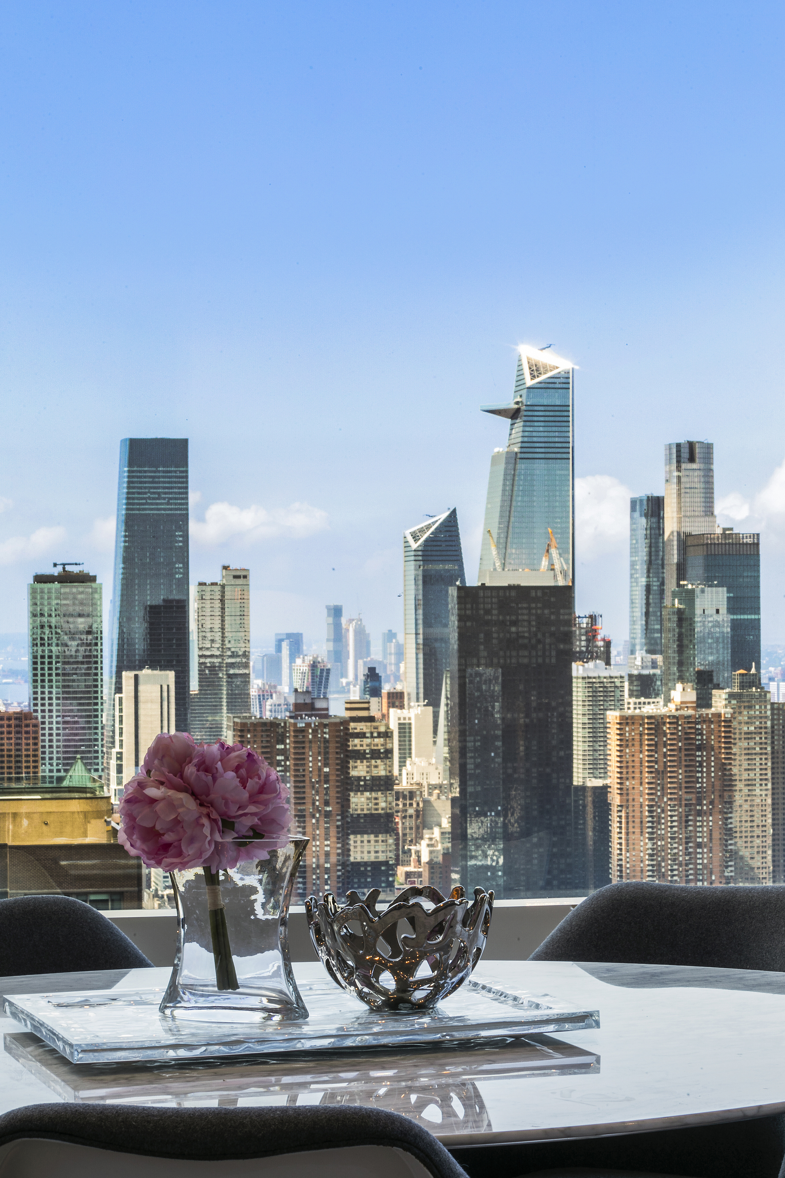 25 Columbus Circle, Unit 65E Manhattan, NY 10019 - Photo 4 of 11 a view of a living room with furniture