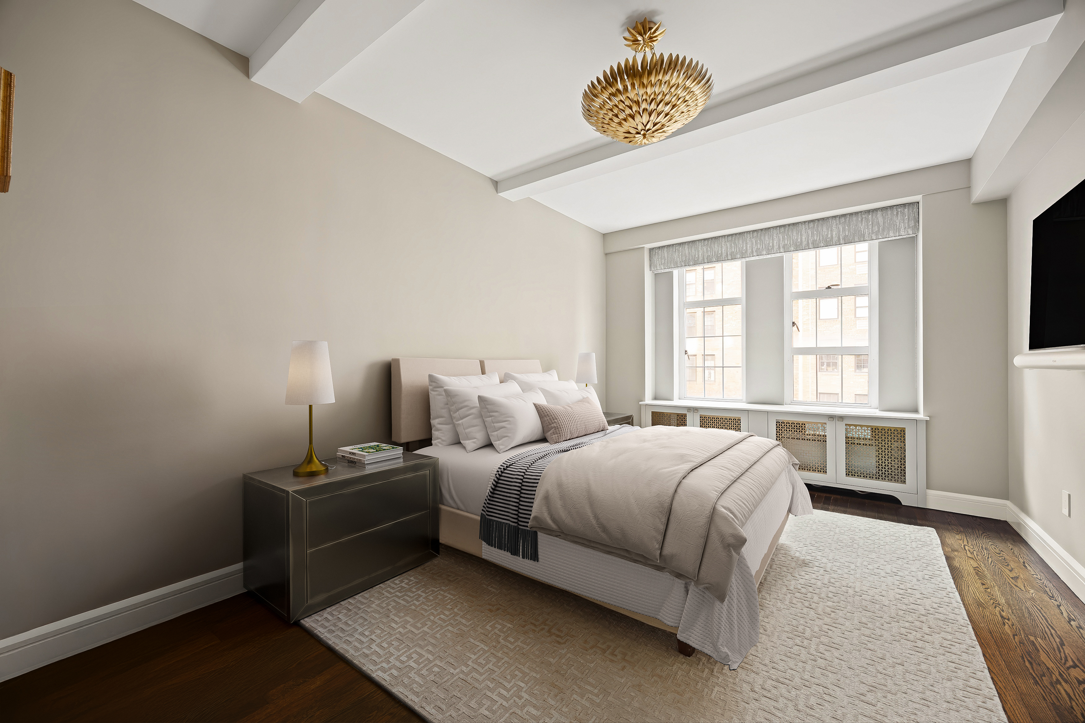 470 West 24th Street, Unit 9J Manhattan, NY 10011 - Photo 7 of 13 a bedroom with a bed and a window