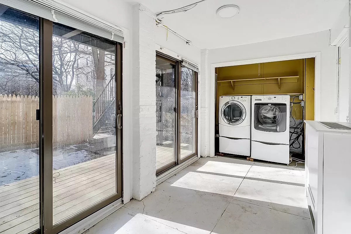 458 West 153 Street Manhattan, NY 10031 - Photo 9 of 16 a utility room with washer and dryer