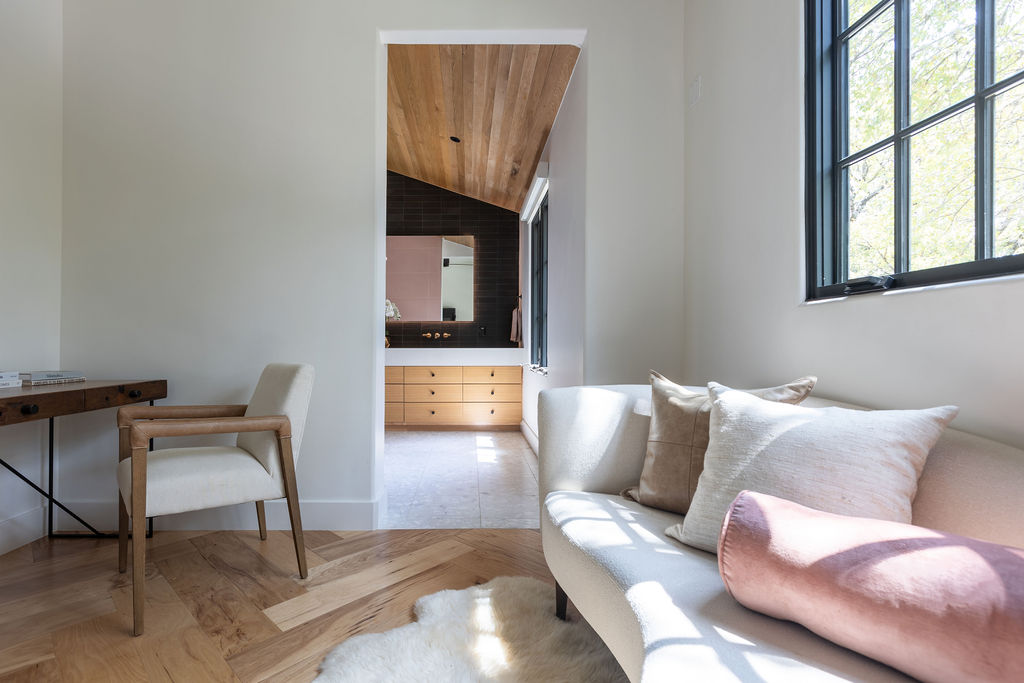 400 Inwood Road Austin, TX 78746 - Photo 36 of 43 a living room with furniture and a potted plant