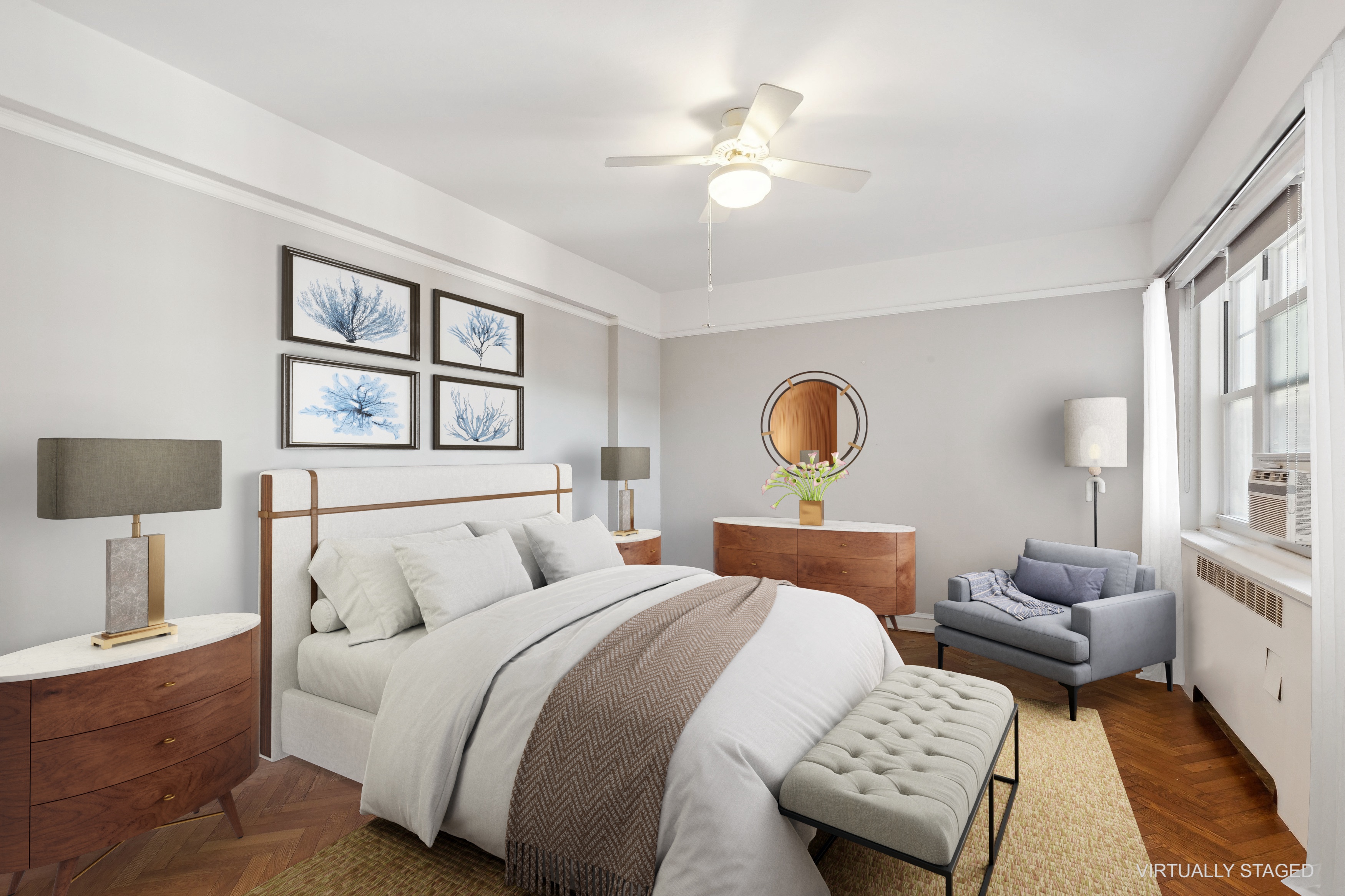 120 Cabrini Boulevard, Unit 107 Manhattan, NY 10033 - Photo 12 of 26 a bedroom with a bed and a chandelier