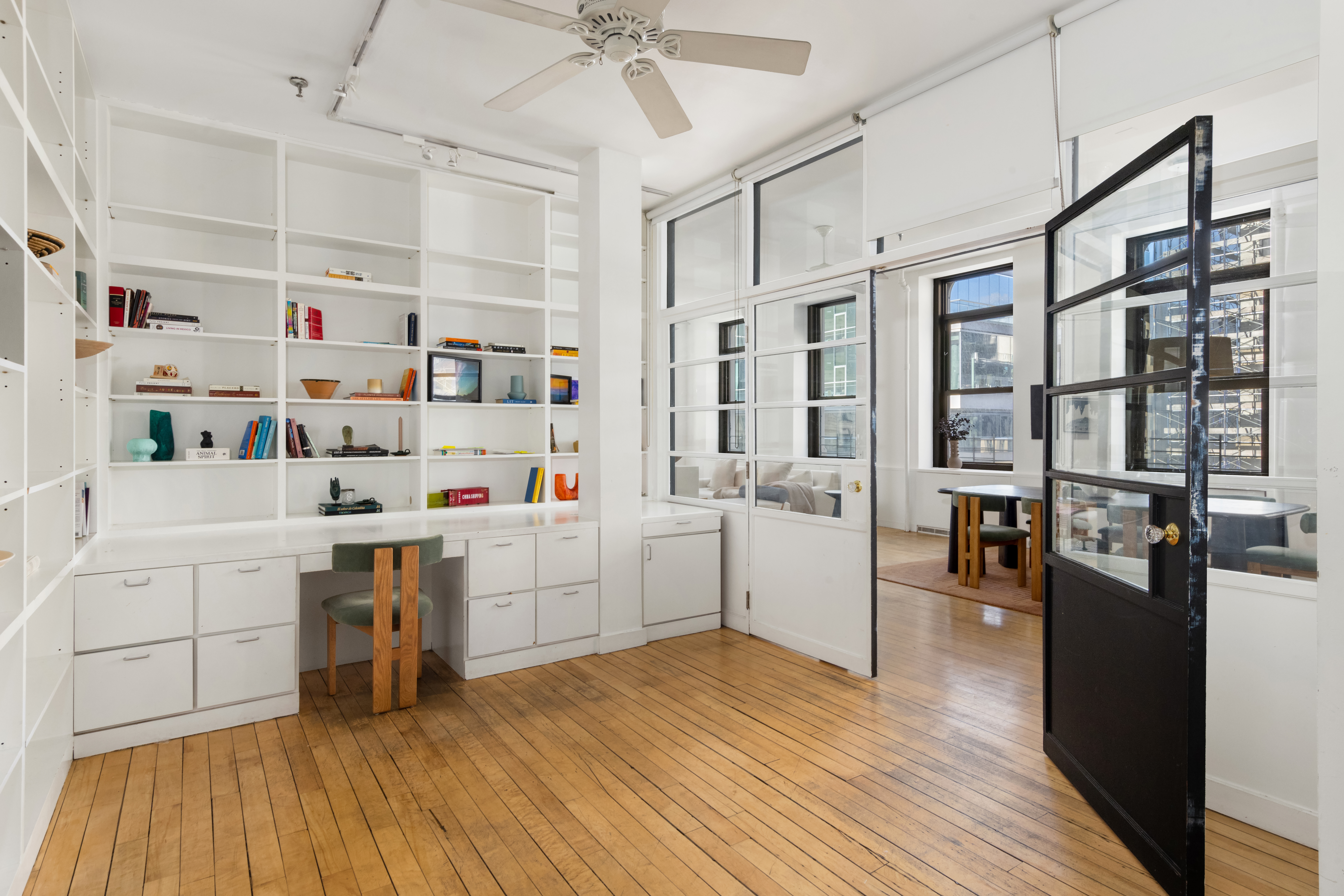 65 Leonard Street, Unit 4 Manhattan, NY 10013 - Photo 6 of 10 a kitchen with cabinets a sink and appliances