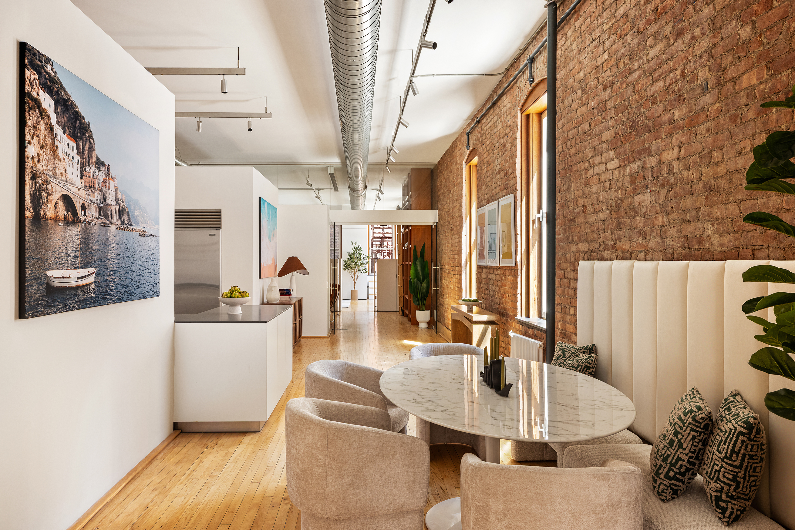 25 East 4th Street, Unit 2 Manhattan, NY 10003 - Photo 3 of 12 a dining room with furniture and wooden floor