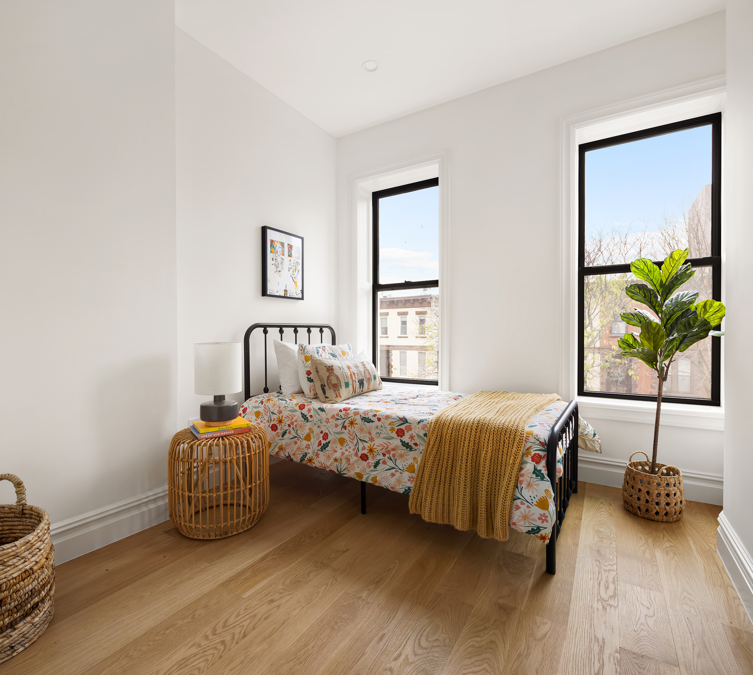 601 Halsey Street Brooklyn, NY 11233 - Photo 9 of 14 a bedroom with bed and a window