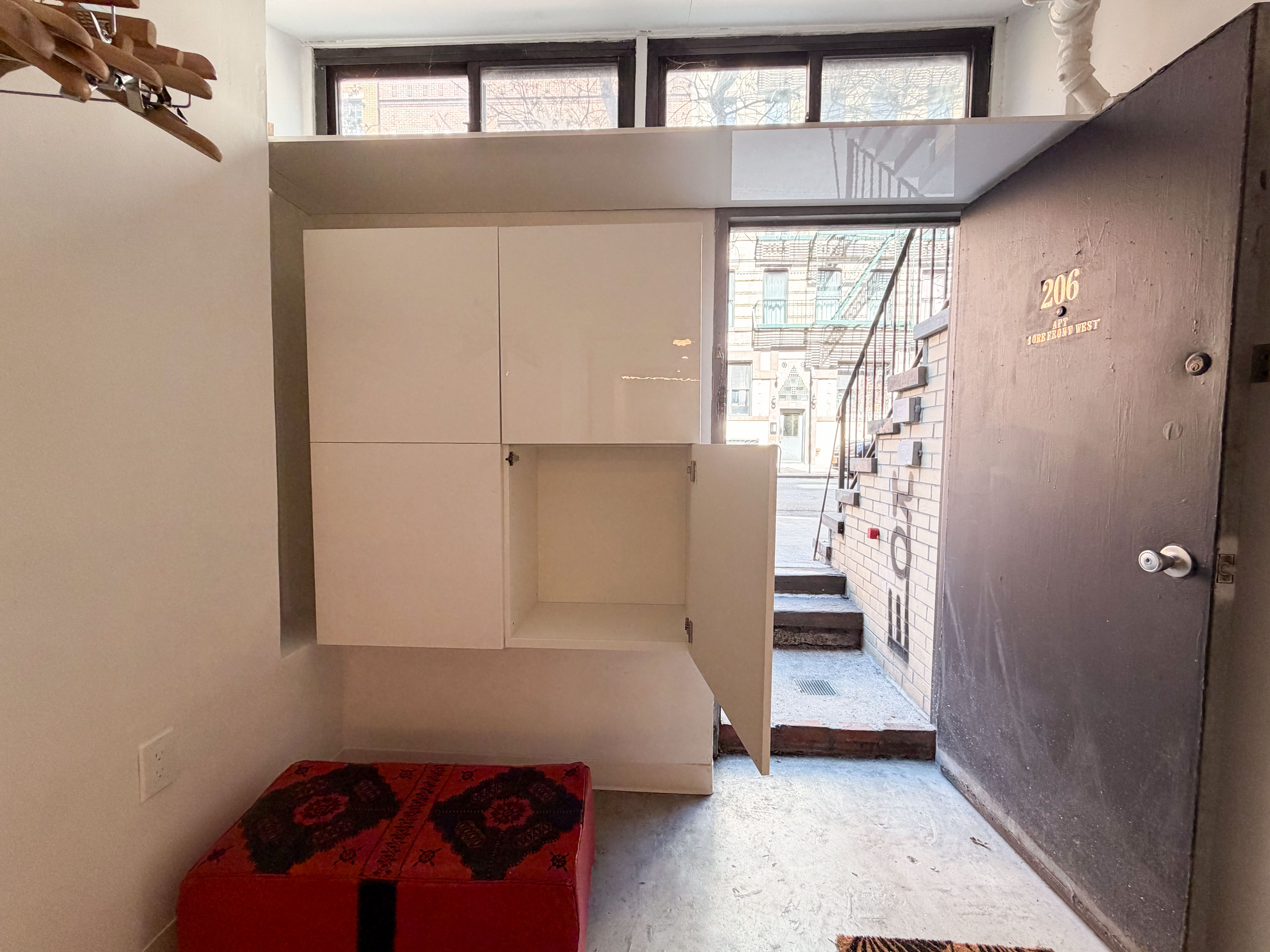 206 East 7th Street, Unit G Manhattan, NY 10009 - Photo 14 of 22 a bathroom with a bathtub and a window