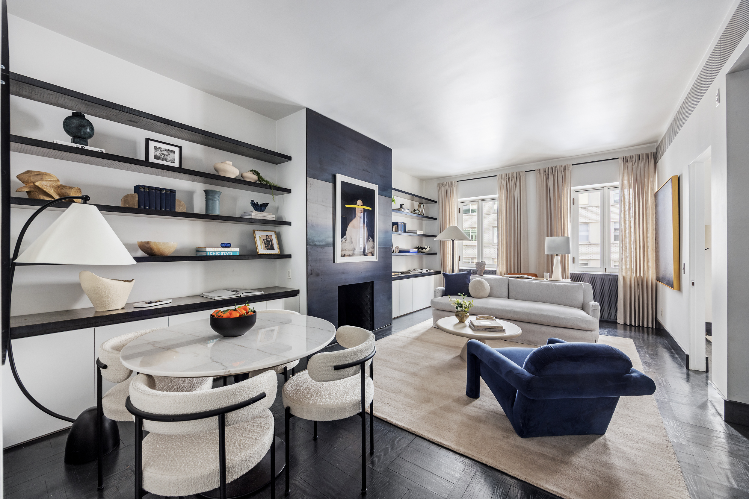 15 East 70th Street, Unit PHB Manhattan, NY 10021 - Photo 22 of 35 a living room with furniture and a wooden floor