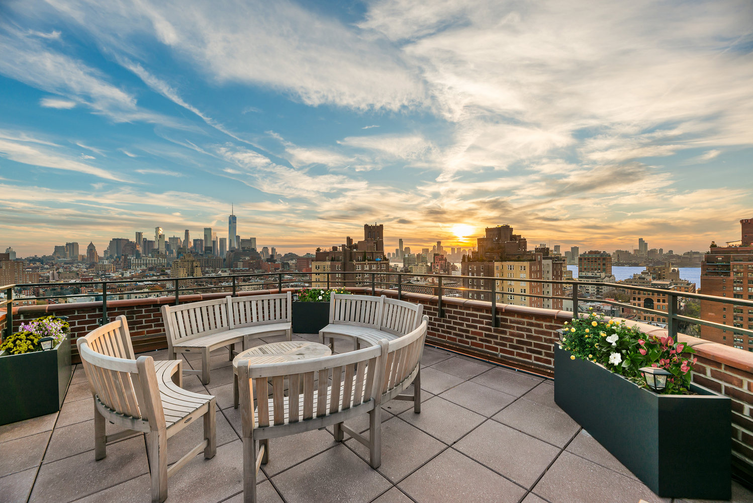31 Jane Street, Unit 7A Manhattan, NY 10014 - Photo 9 of 11 a view of a chairs and table on the terrace