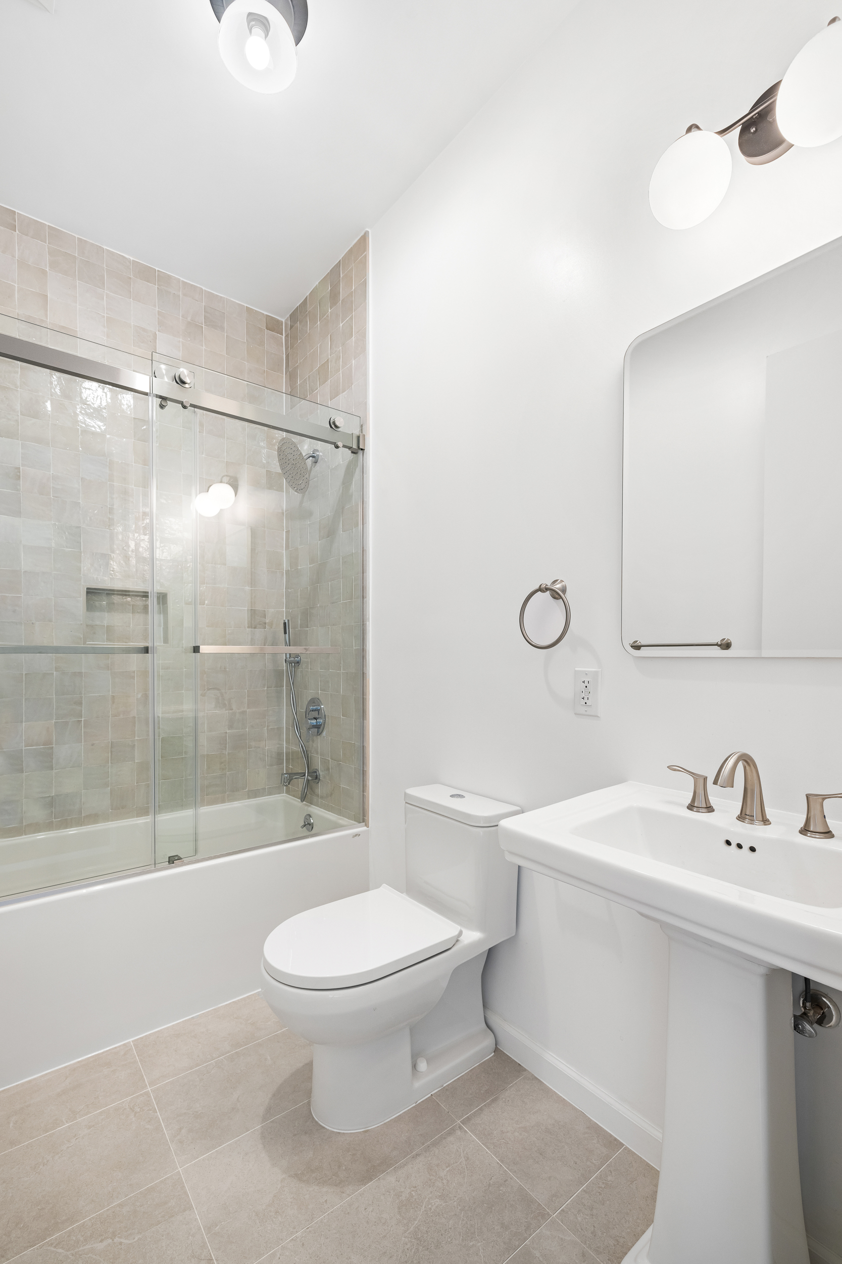 317 Court Street, Unit 2 Brooklyn, NY 11231 - Photo 9 of 14 a bathroom with a sink toilet and shower