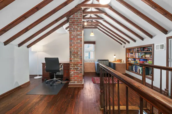 a view of livingroom with furniture and wooden floor