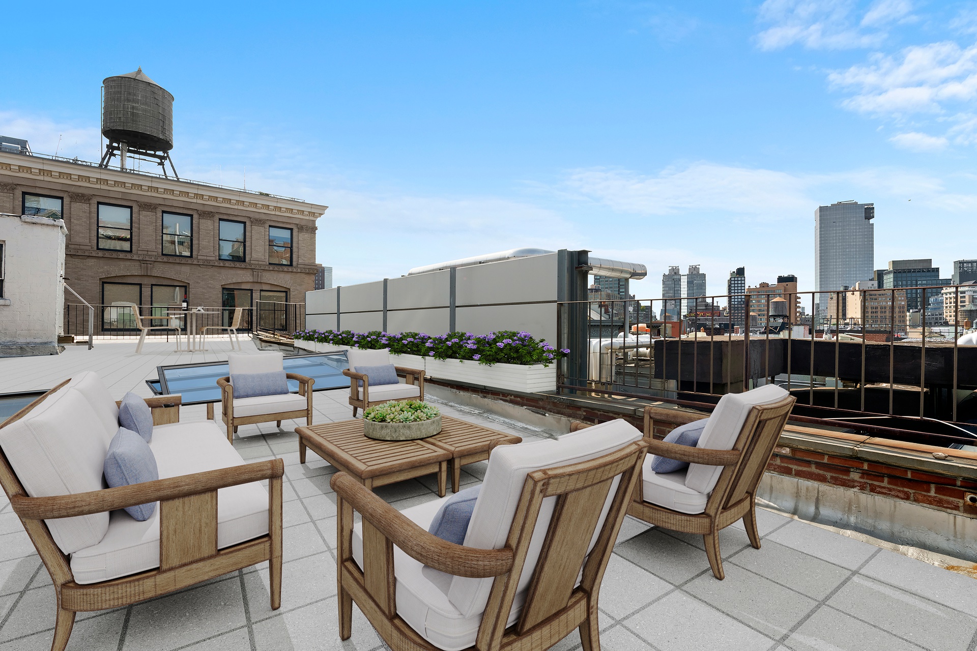 99 Spring Street, Unit PH6 Manhattan, NY 10012 - Photo 18 of 23 a view of a terrace with furniture and a fire pit