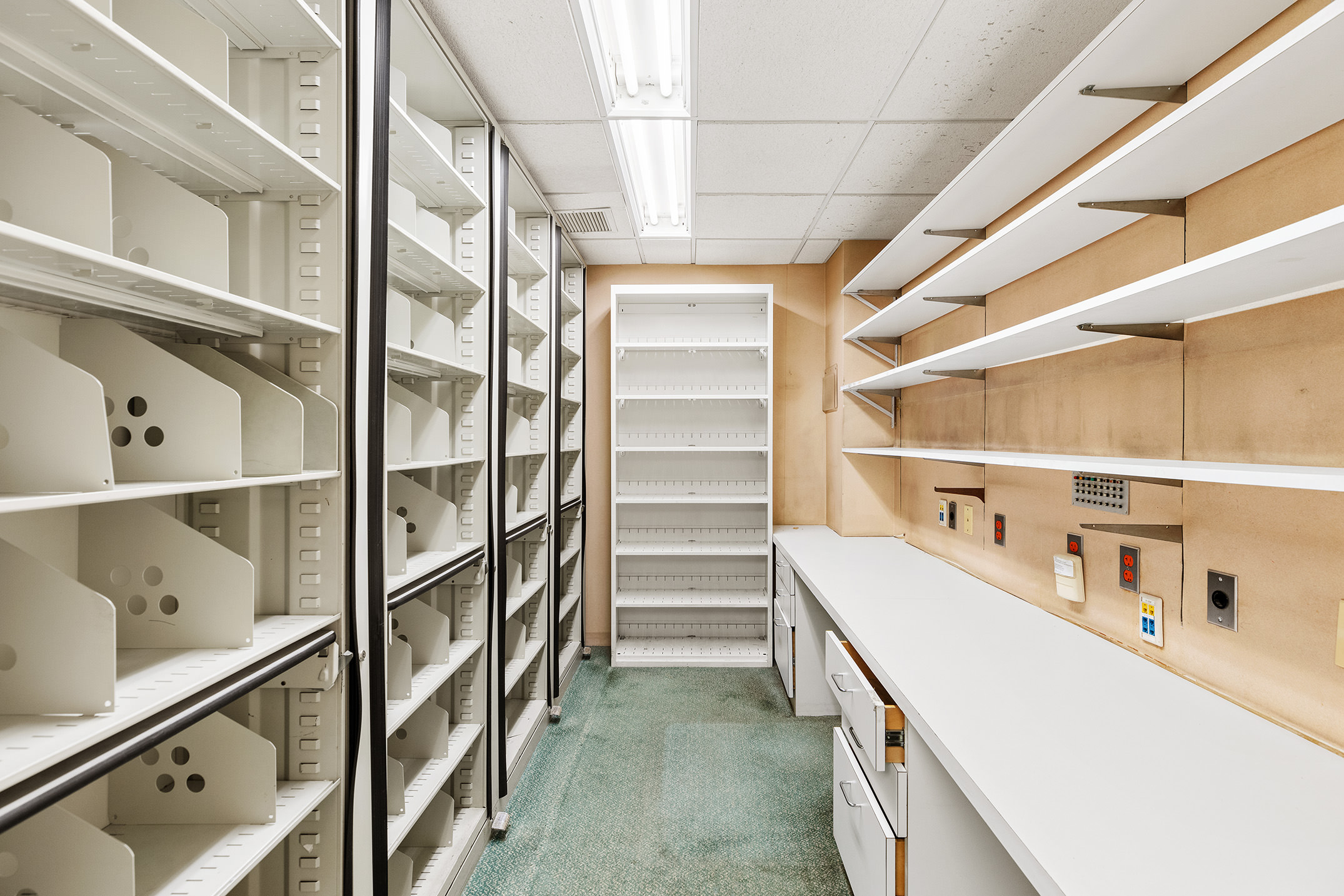 47 East 88th Street Manhattan, NY 10128 - Photo 3 of 11 a view of walk in closet with empty racks