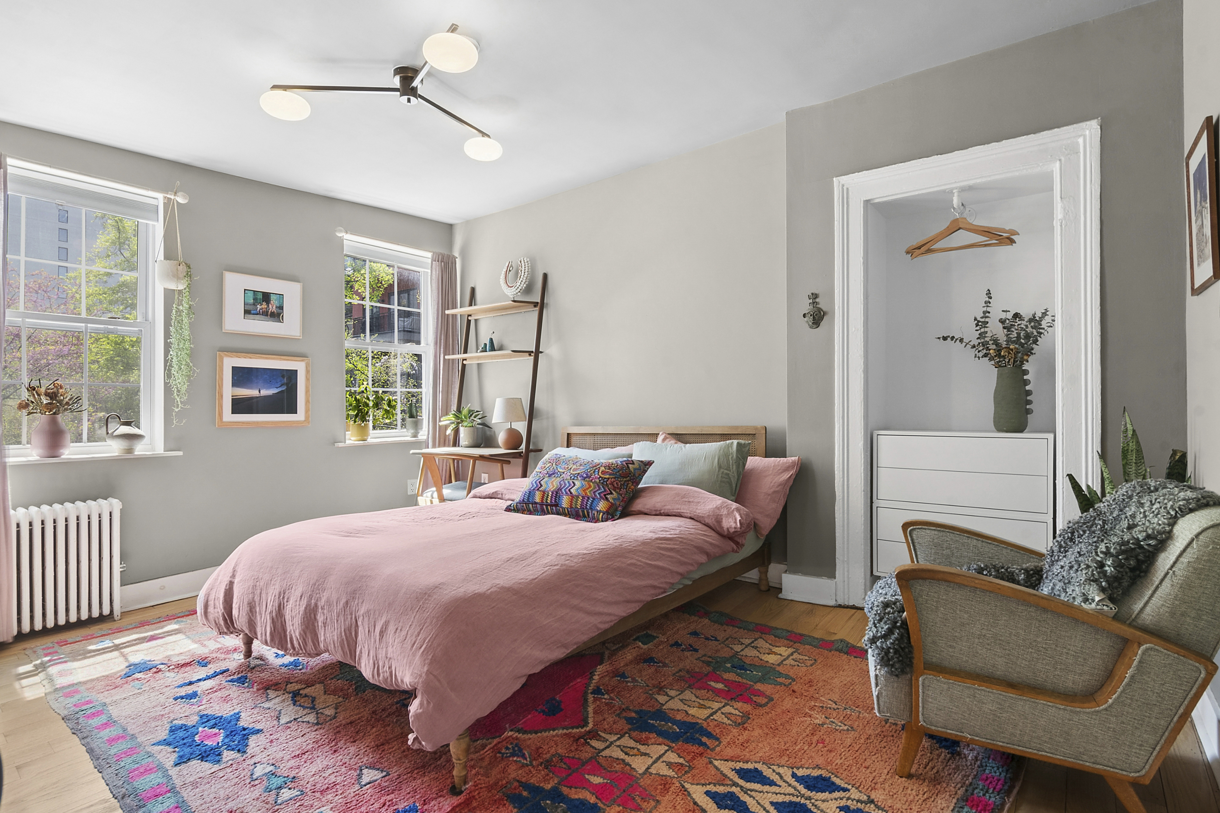 190 Concord Street Brooklyn, NY 11201 - Photo 6 of 14 a bedroom with a bed and wooden floor