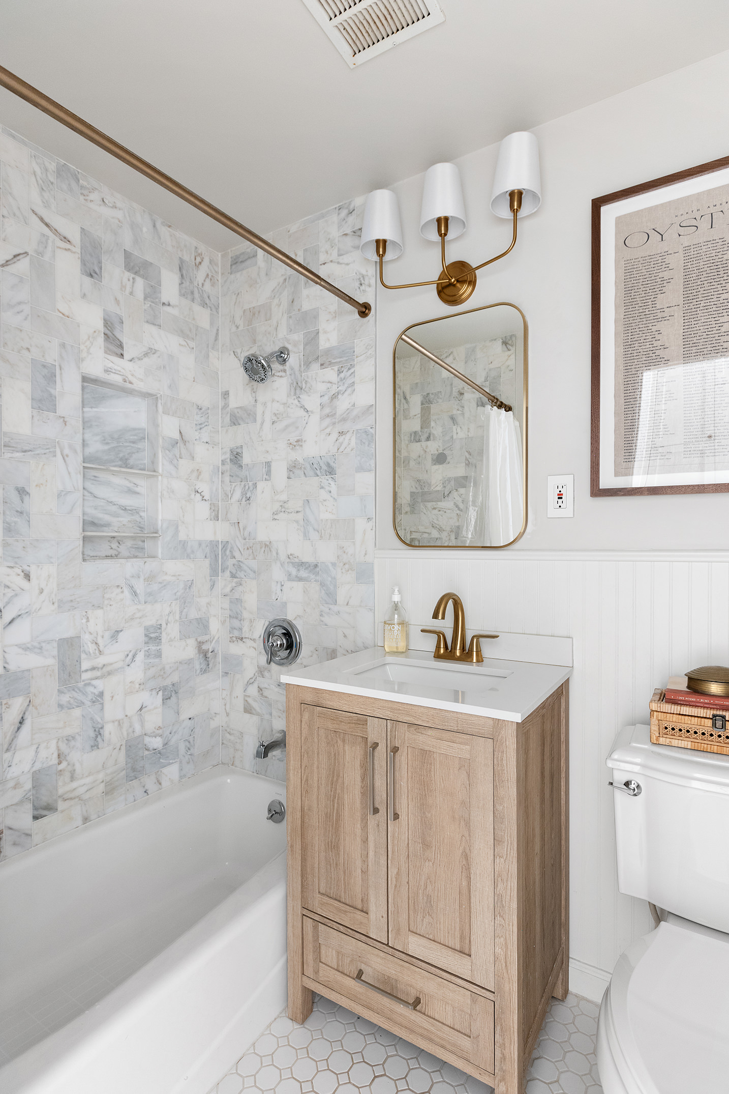 648 2nd Street, Unit 2 Brooklyn, NY 11215 - Photo 12 of 16 a bathroom with a sink a mirror and a toilet