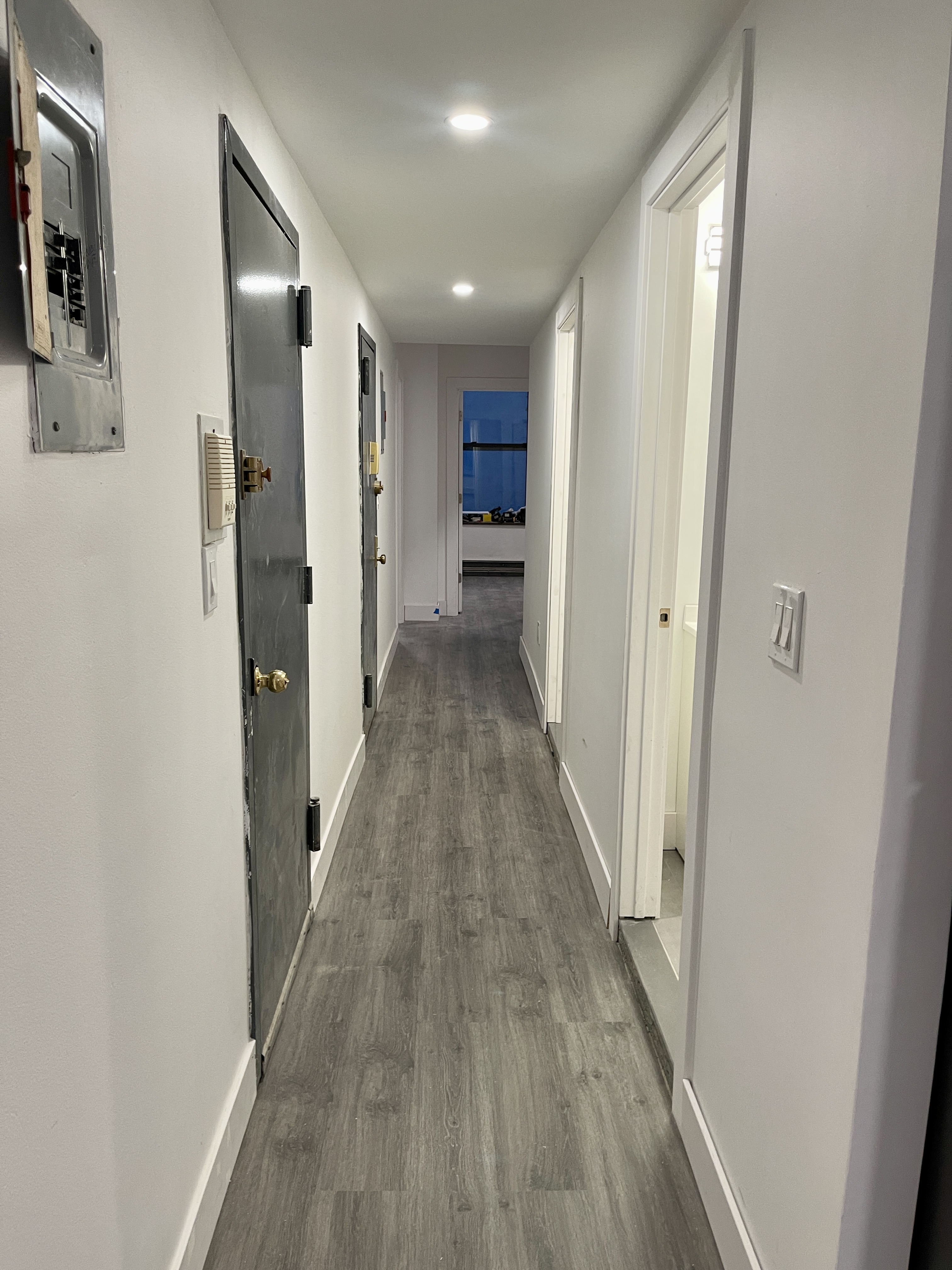 1999 3rd Avenue, Unit 1 Manhattan, NY 10029 - Photo 15 of 23 a view of a hallway with wooden floor