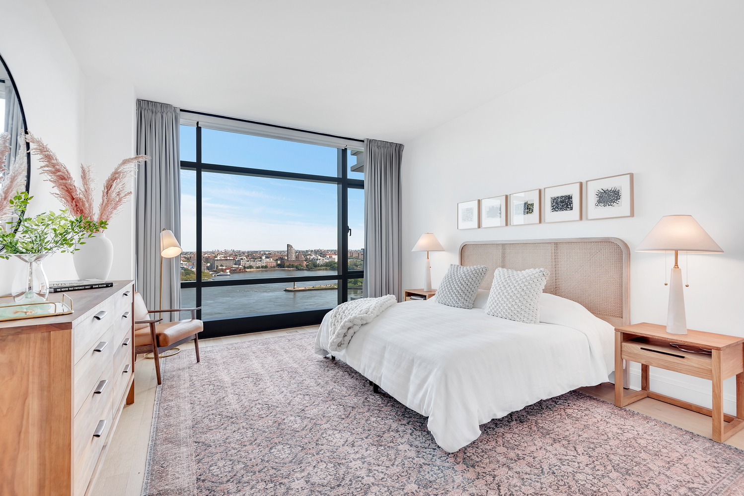 170 East End Avenue, Unit 16B Manhattan, NY 10128 - Photo 3 of 21 a bedroom with a bed and a night stand