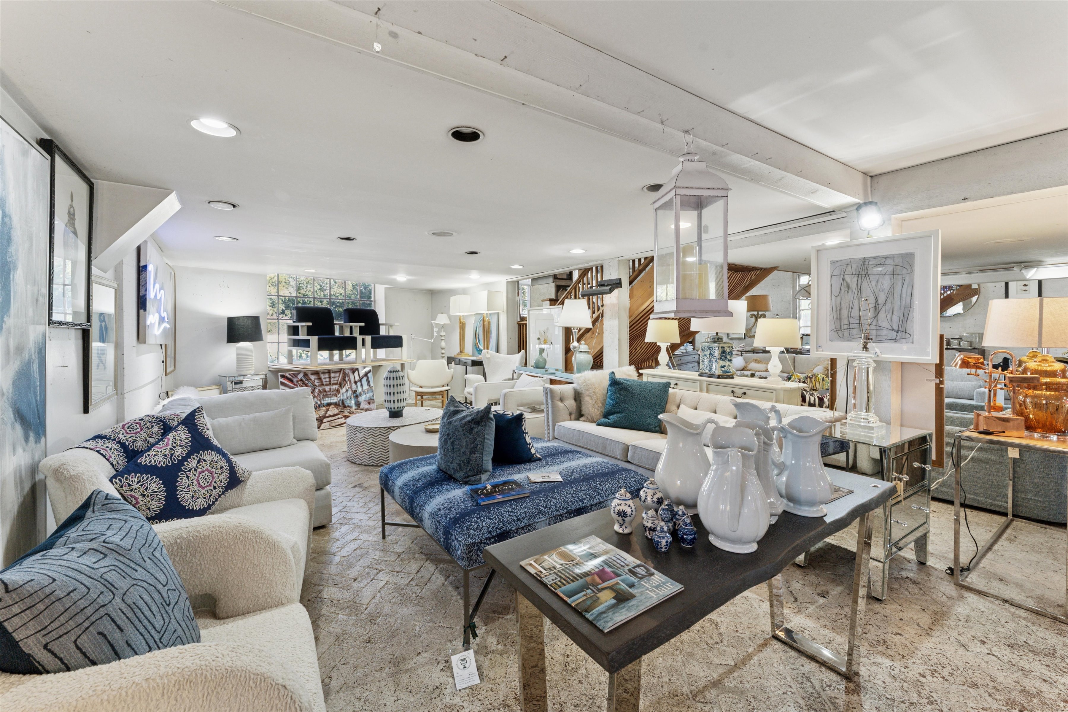 53 North Sea Road Southampton, NY 11968 - Photo 12 of 15 a living room with lots of furniture and view of kitchen