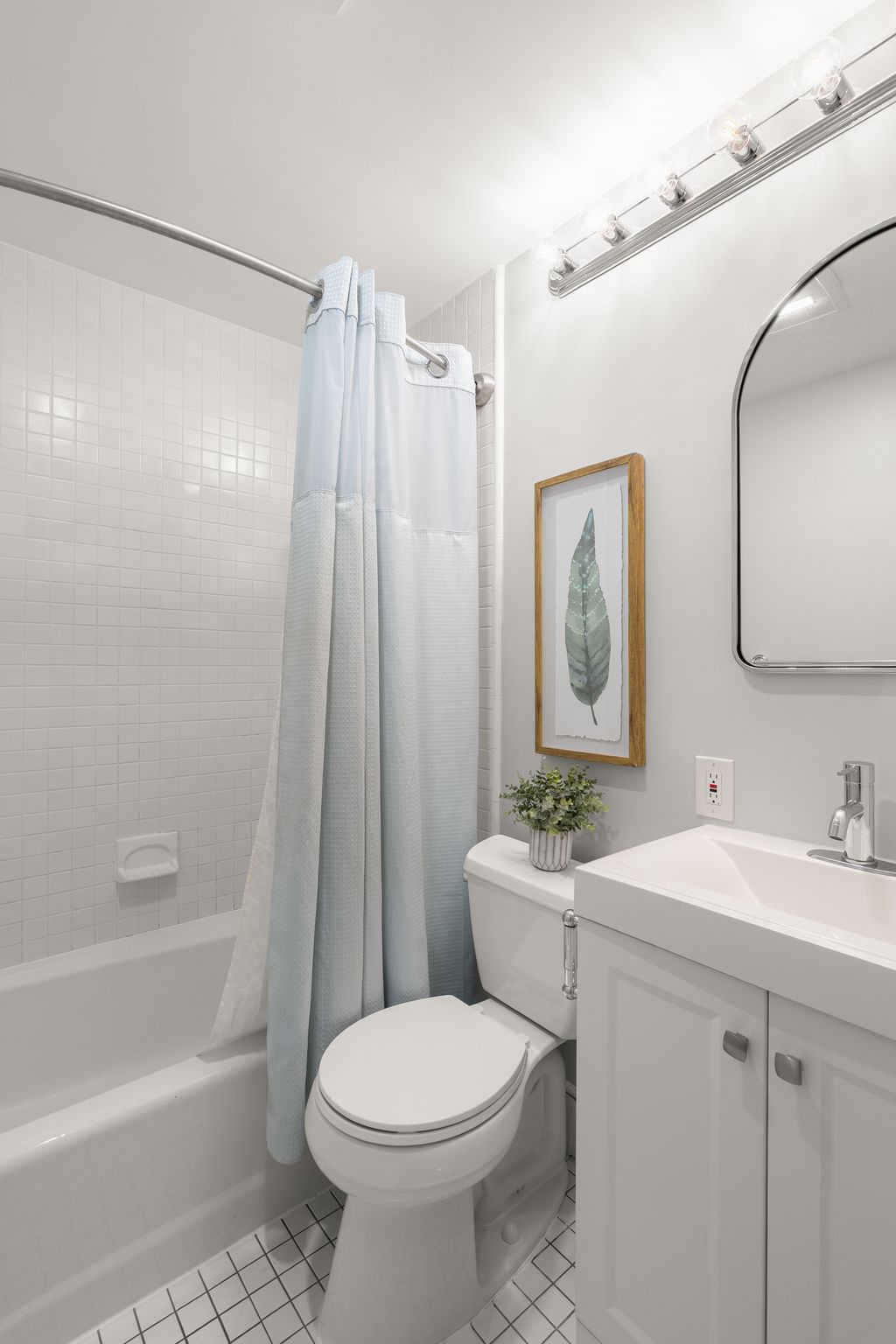 88 Hancock Street, Unit 17 Cambridge, MA 02139 - Photo 12 of 18 a bathroom with a sink toilet and shower