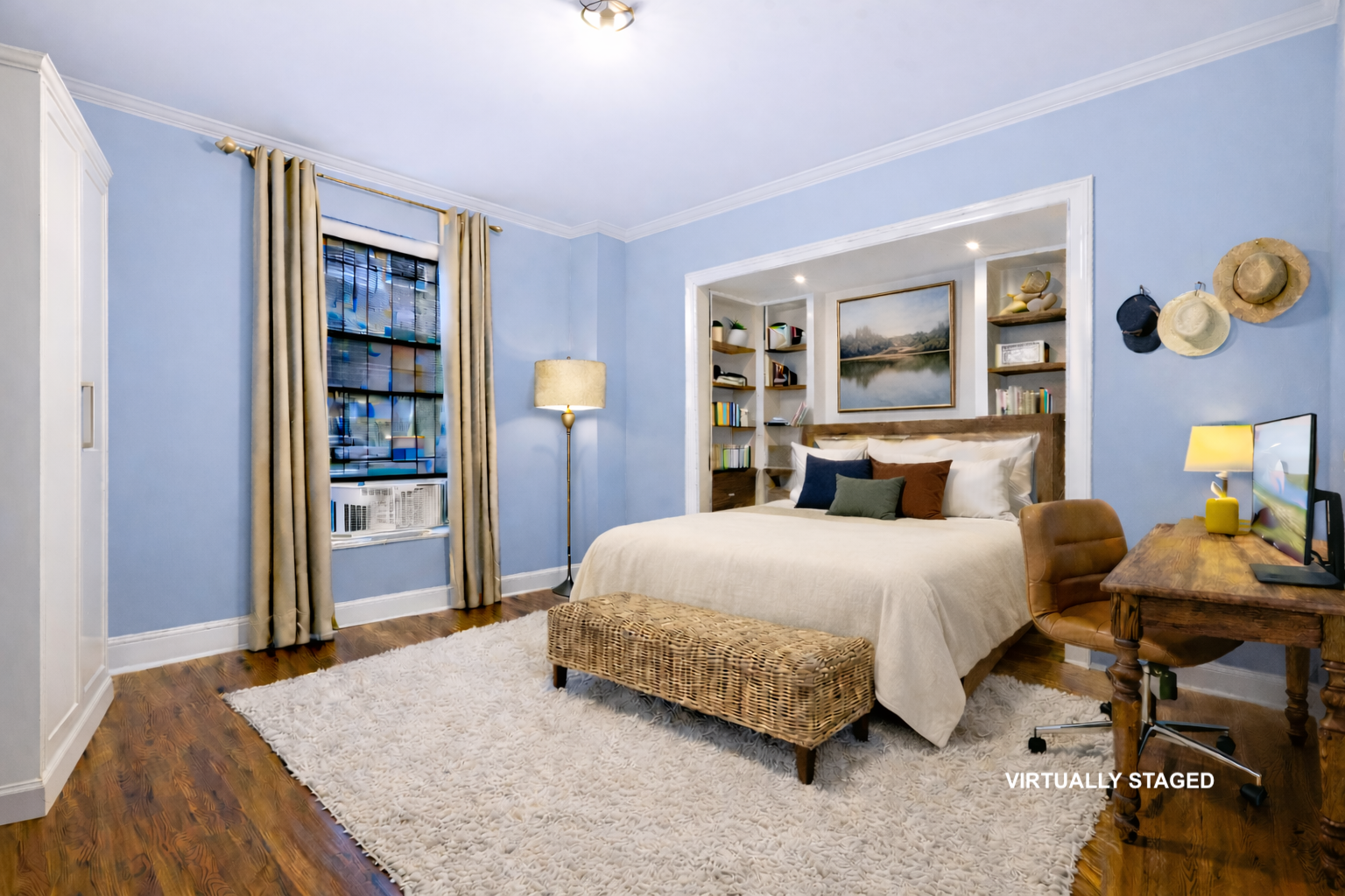 26 West 97th Street, Unit 2C Manhattan, NY 10025 - Photo 7 of 9 a bedroom with a bed and dresser with mirror