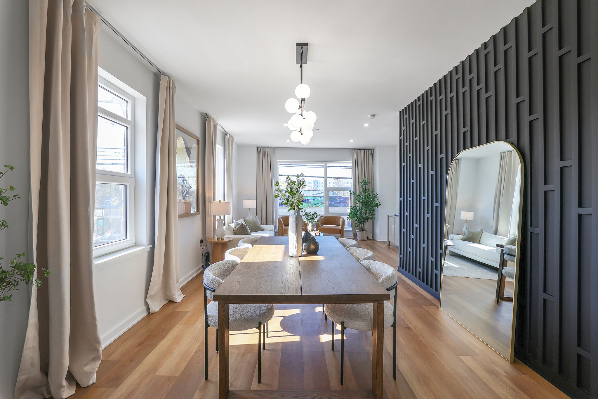 1036 Howard Road Southeast Washington, DC 20020 - Photo 16 of 41 a dining room with wooden floor a glass table and chairs