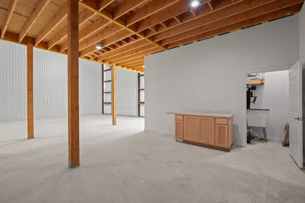 a view of a room with wooden walls
