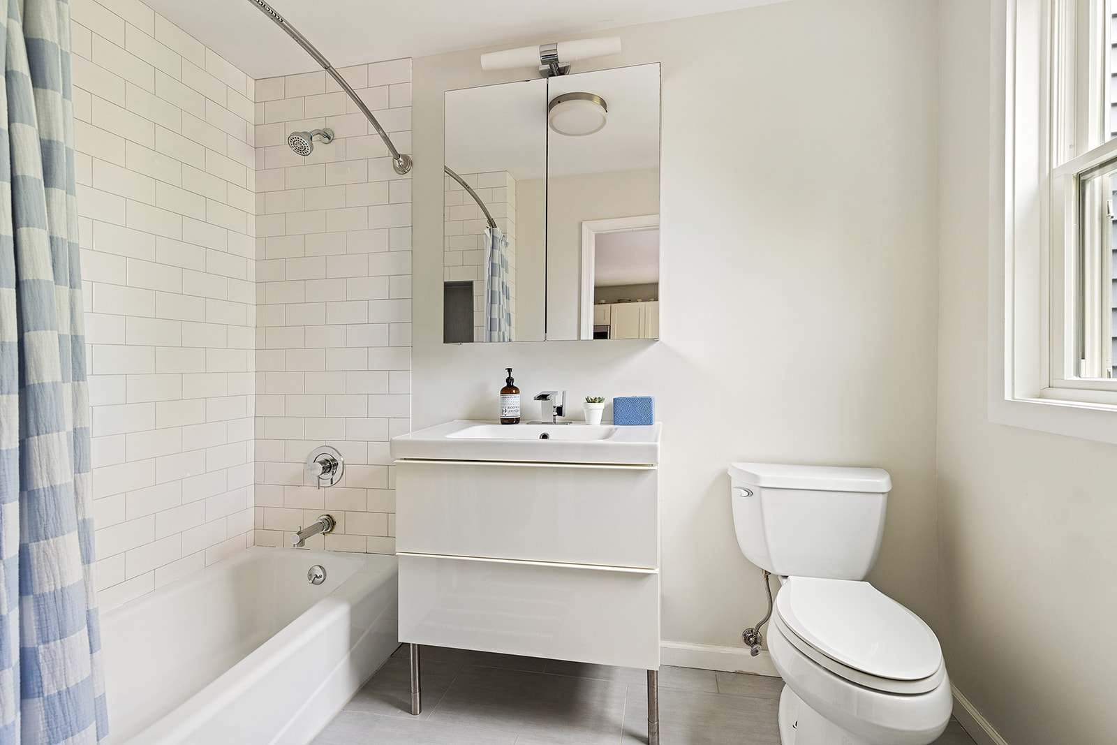 682 A 6th Avenue Brooklyn, NY 11215 - Photo 14 of 16 a bathroom with a sink a toilet and bathtub