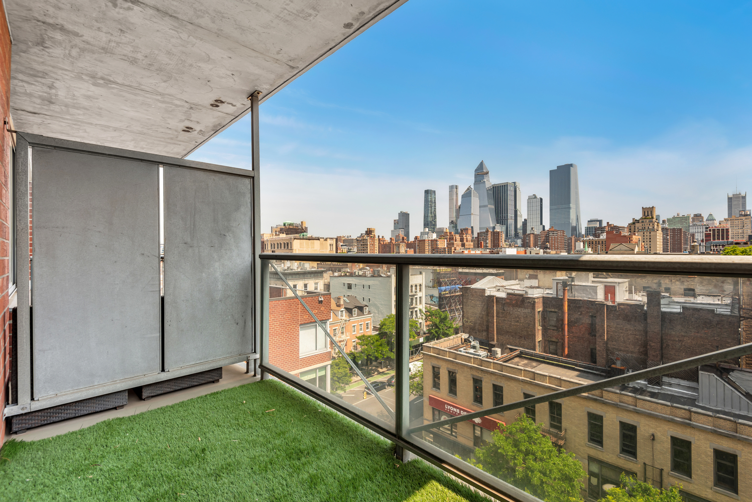 a view of a balcony with city view