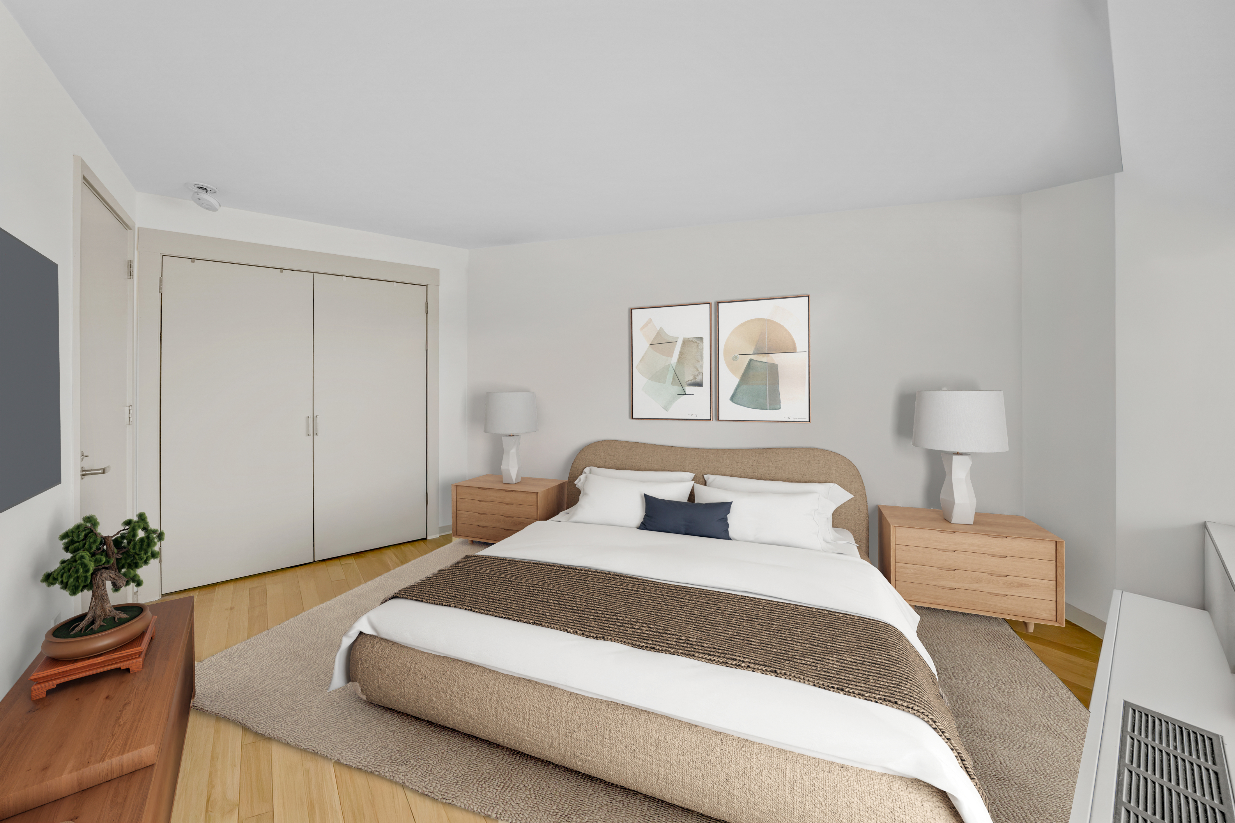 448 West 167th Street, Unit 3E Manhattan, NY 10032 - Photo 10 of 24 a bedroom with a bed and a potted plant