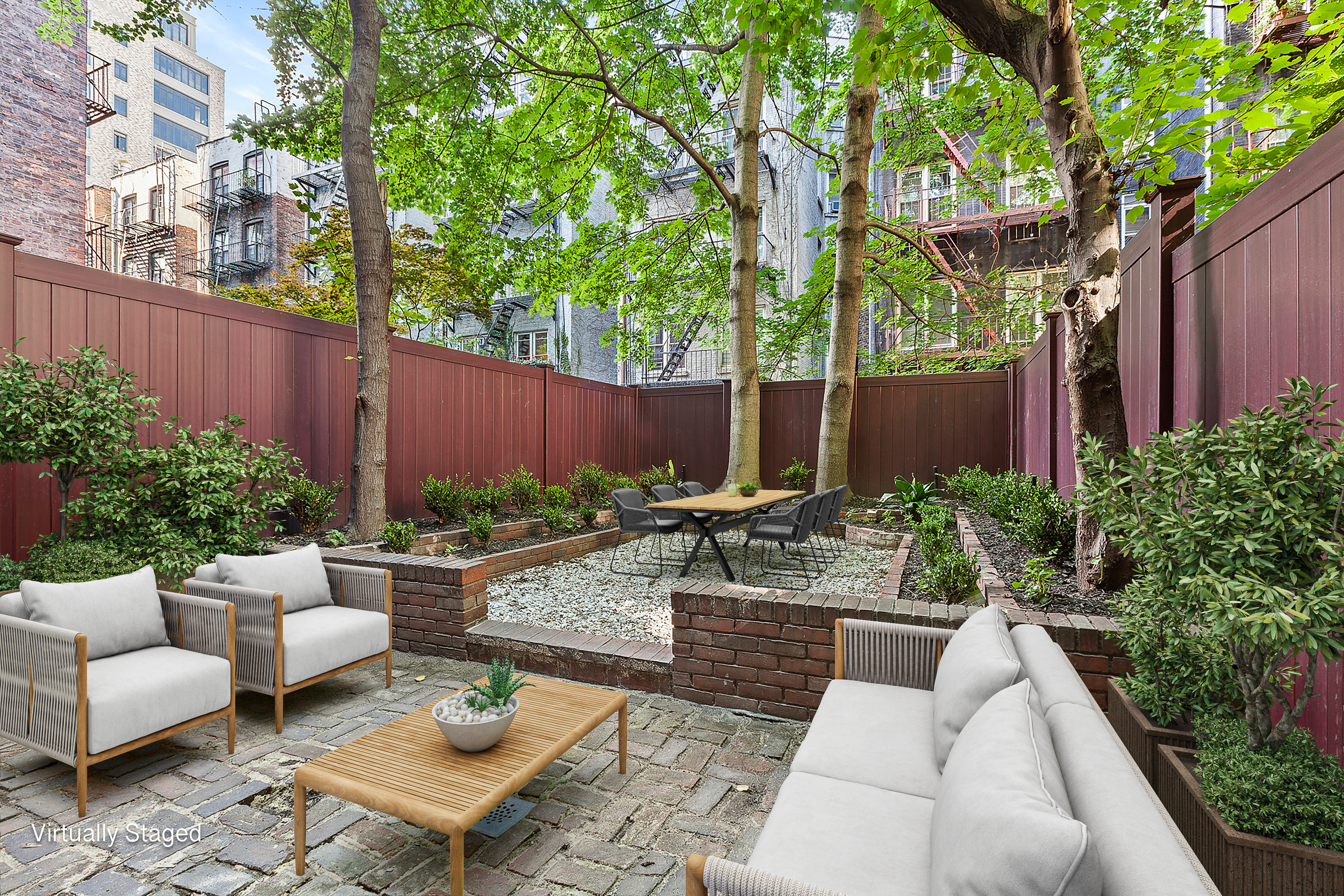 522 East 82nd Street, Unit 1 Manhattan, NY 10028 - Photo 1 of 16 a view of a backyard with couches table and chairs potted plants and large tree