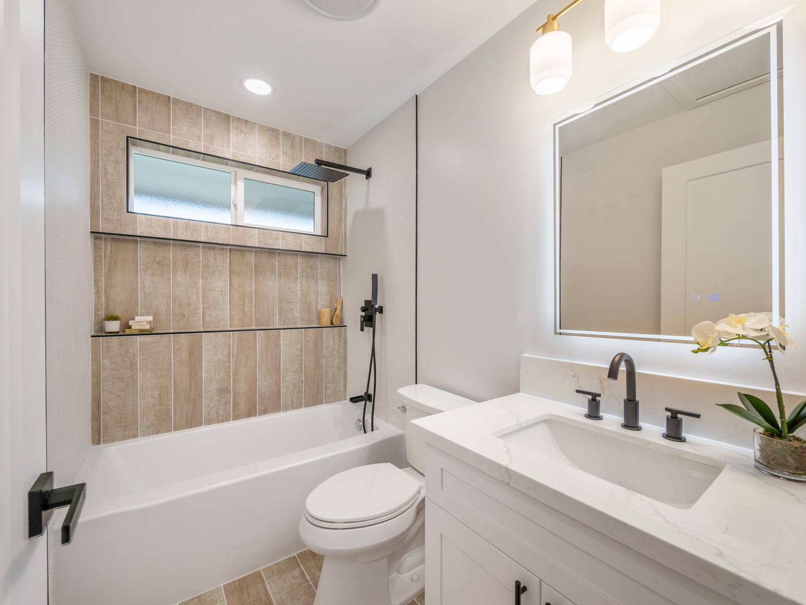 45-561 Paleka Road, Unit C Kaneohe, HI 96744 - Photo 17 of 27 a bathroom with a sink toilet and shower