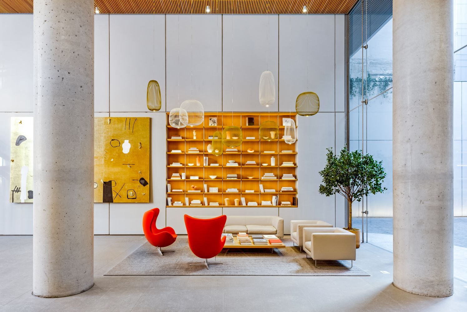 565 Broome Street, Unit N6I Manhattan, NY 10013 - Photo 7 of 15 a dining room with table and potted plants