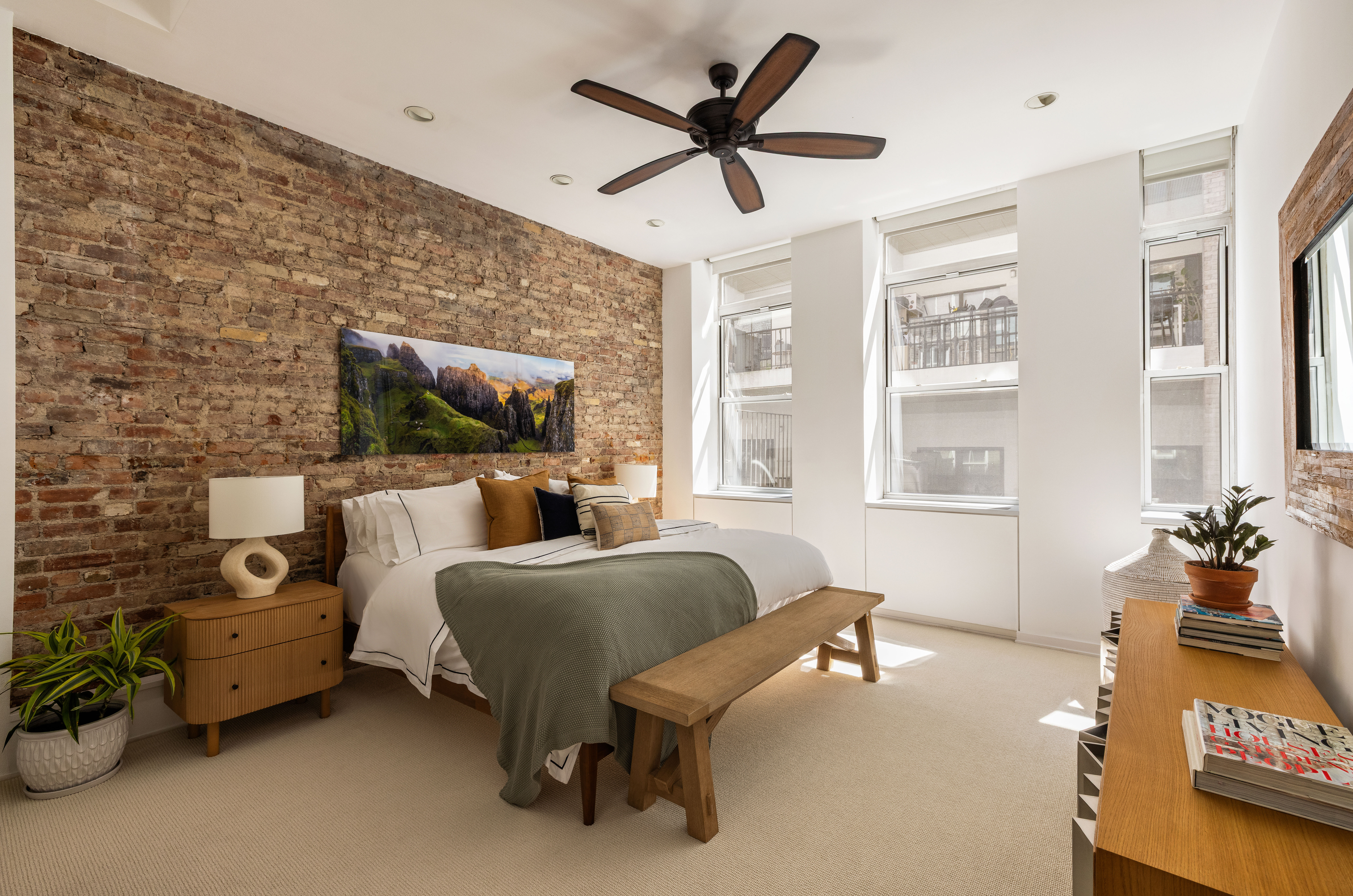 56 East 11th Street, Unit 5 Manhattan, NY 10003 - Photo 7 of 18 a living room with furniture and a window