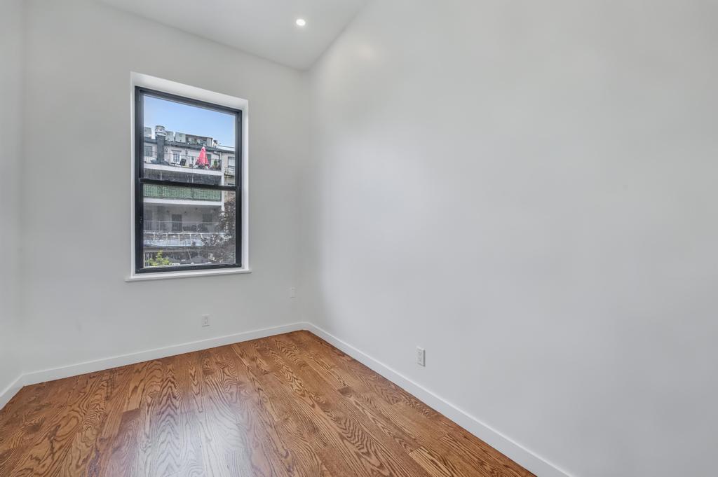 109 President Street, Unit 2 Brooklyn, NY 11231 - Photo 14 of 20 a view of a hallway with wooden floor