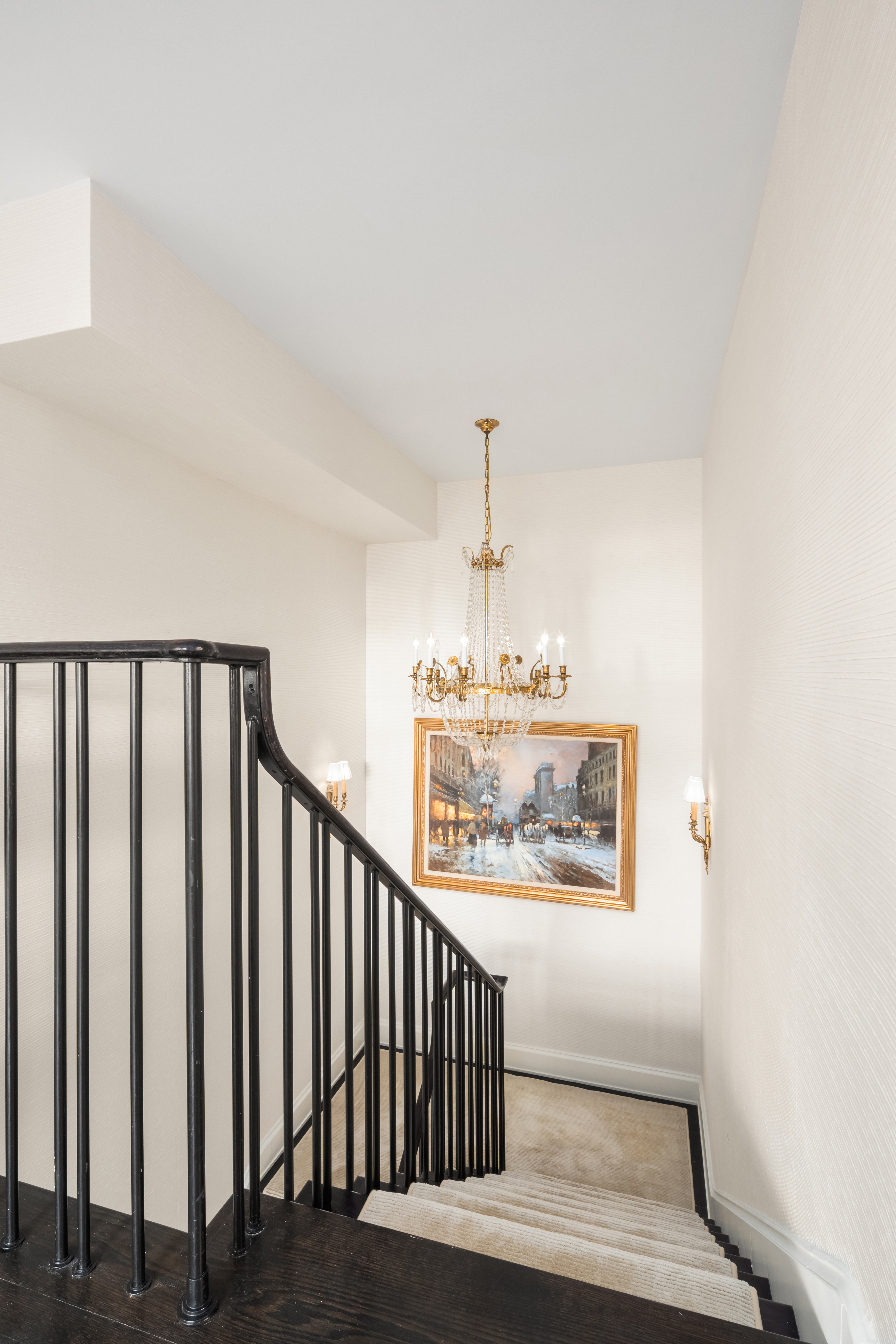 150 West 12th Street, Unit 3WEST Manhattan, NY 10011 - Photo 28 of 39 a view of a hallway with wooden floor and staircase