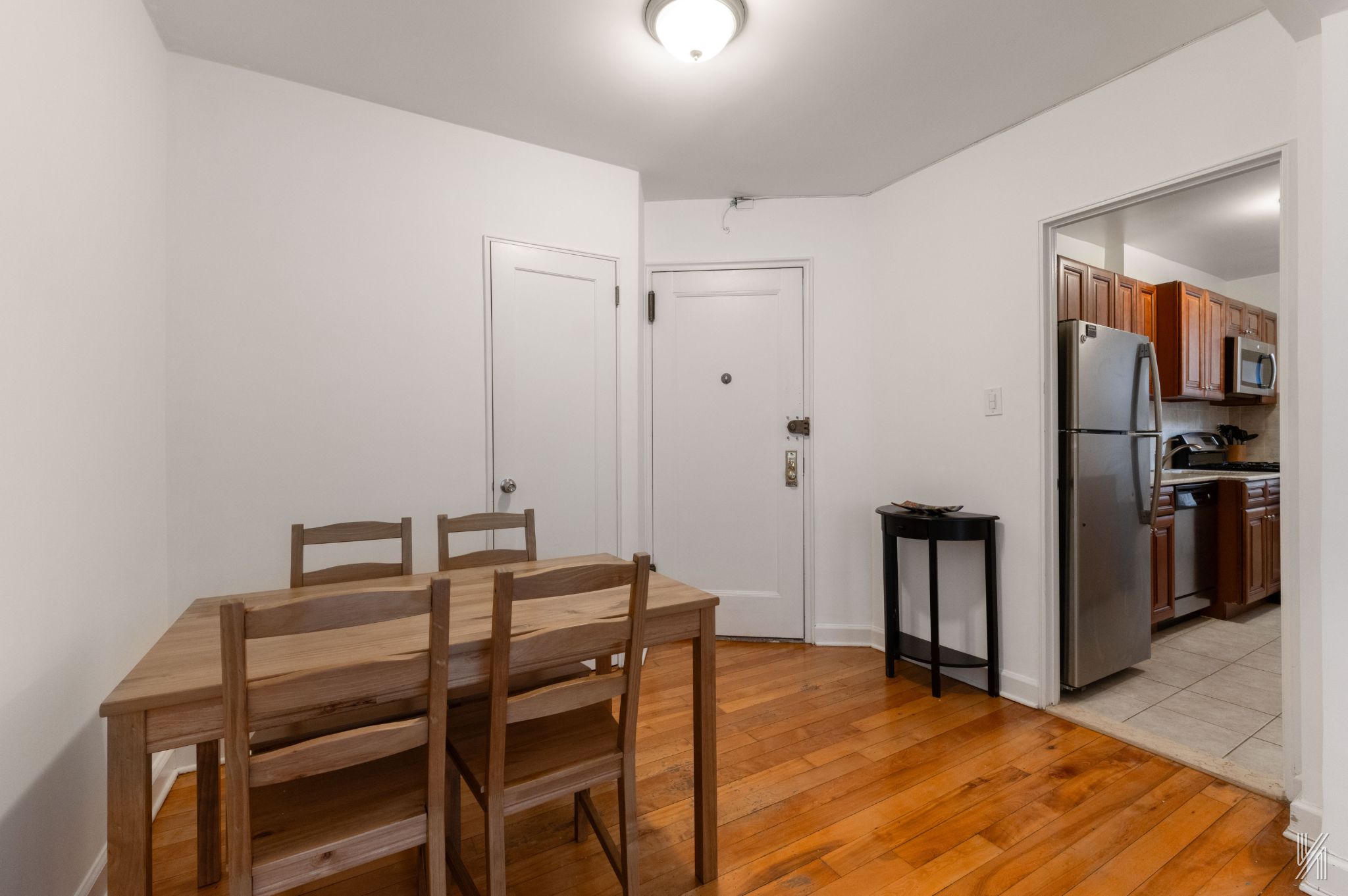39-55 51st Street, Unit 3G Queens, NY 11377 - Photo 7 of 18 a view of a dining room with furniture
