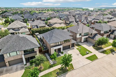 an aerial view of a house with a garden