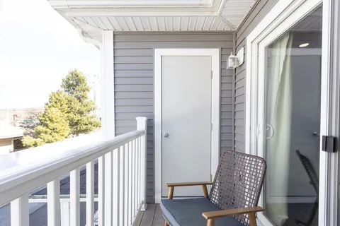 a view of a porch with a bench