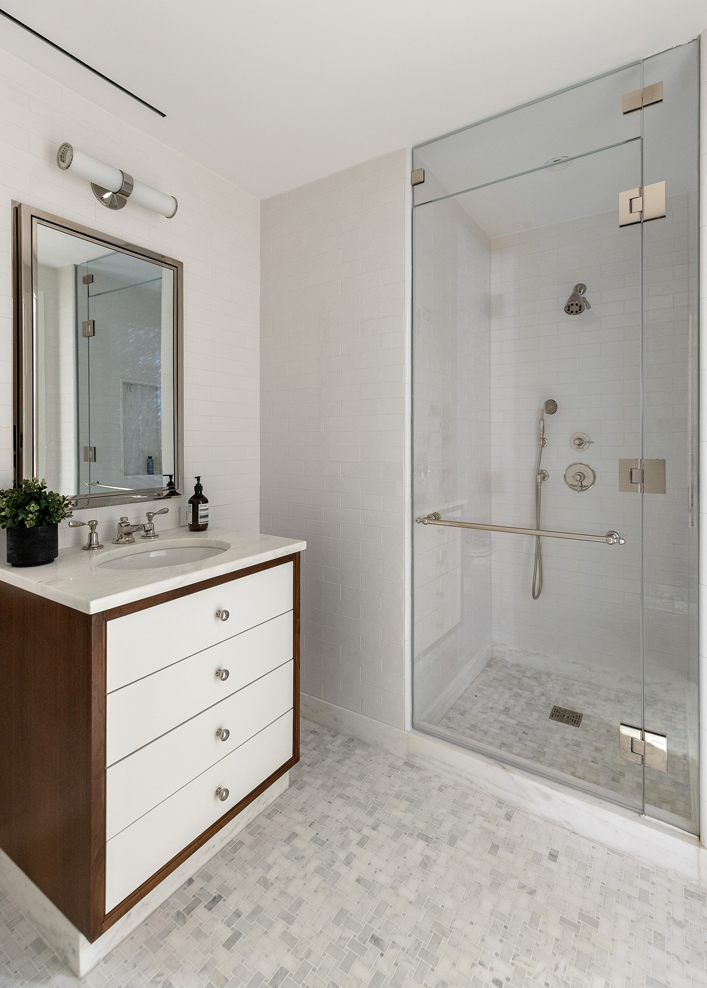 360 Central Park West, Unit 2B Manhattan, NY 10025 - Photo 13 of 23 a bathroom with a shower sink and mirror