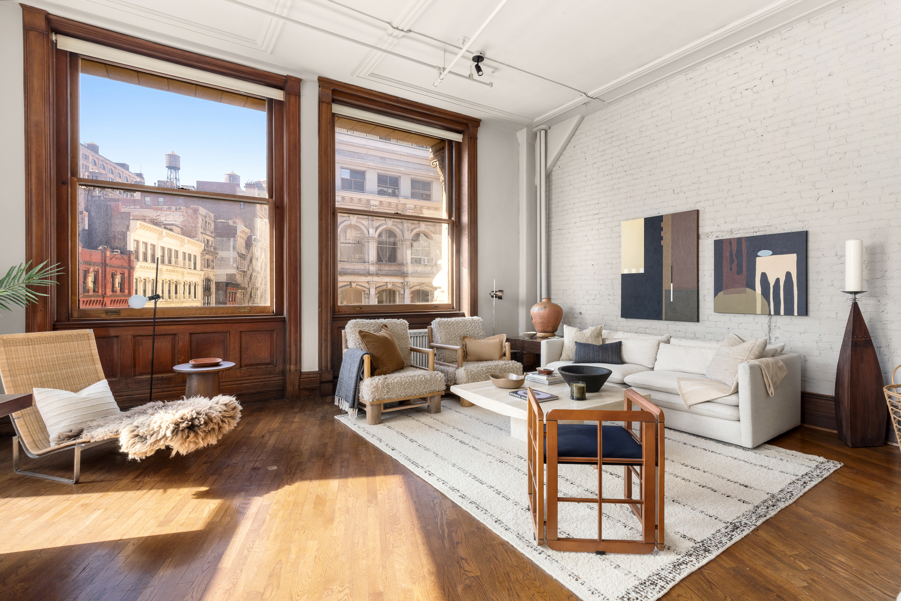874 Broadway, Unit 501 Manhattan, NY 10003 - Photo 2 of 17 a living room with furniture or couch and a window