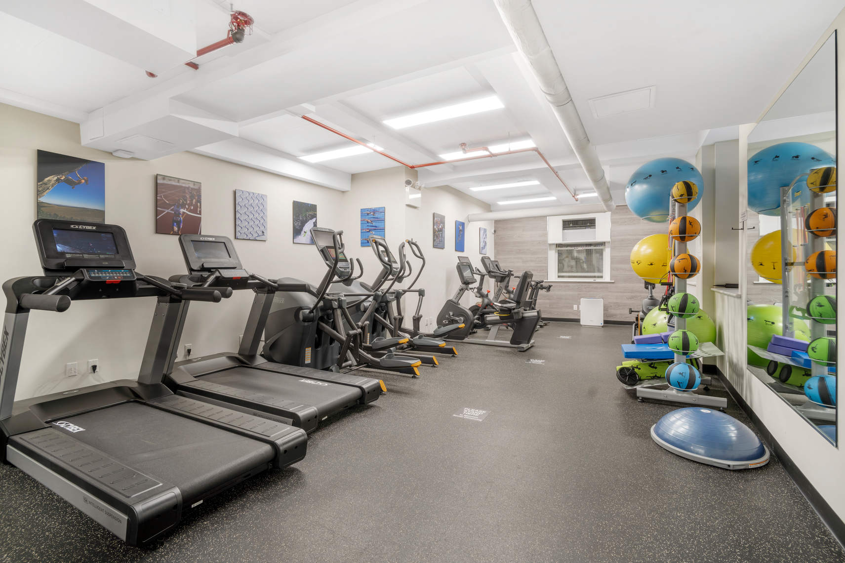 70 East 77th Street, Unit 6A Manhattan, NY 10075 - Photo 15 of 17 a view of a room with gym equipment