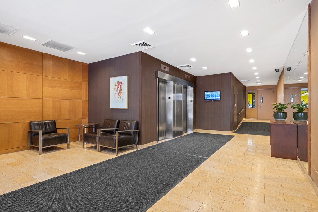 244 Madison Avenue, Unit 4D Manhattan, NY 10016 - Photo 7 of 9 a lobby with furniture and window