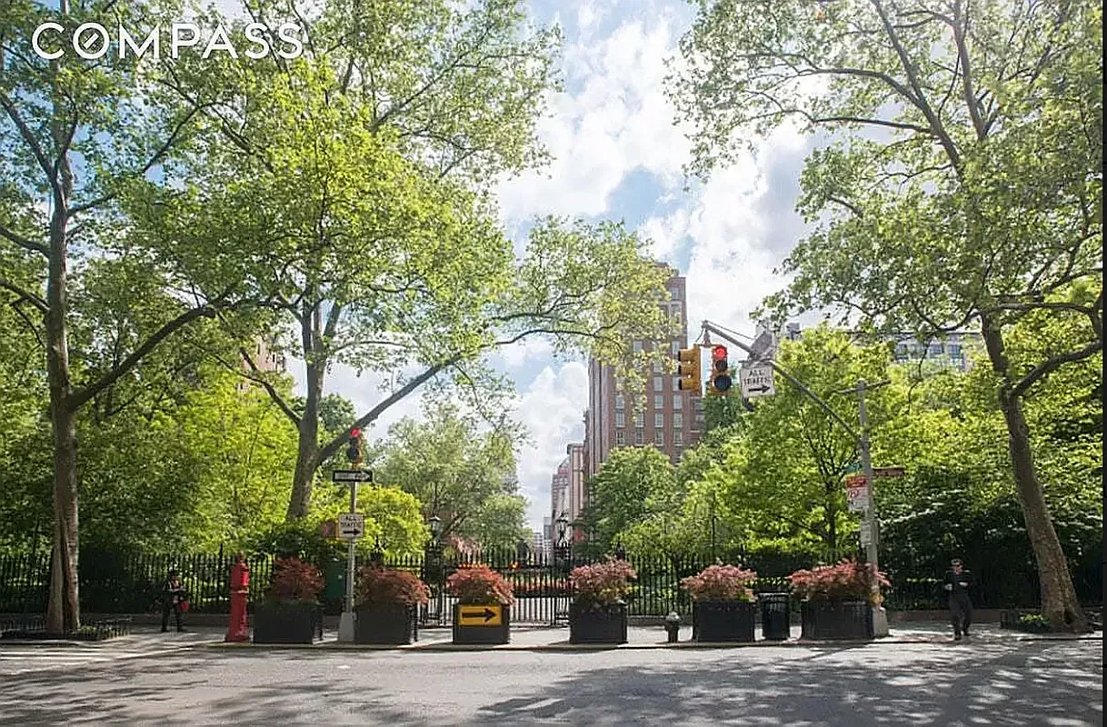 145 East 22nd Street, Unit 4A Manhattan, NY 10010 - Photo 9 of 14 a row of palm trees in front of a building