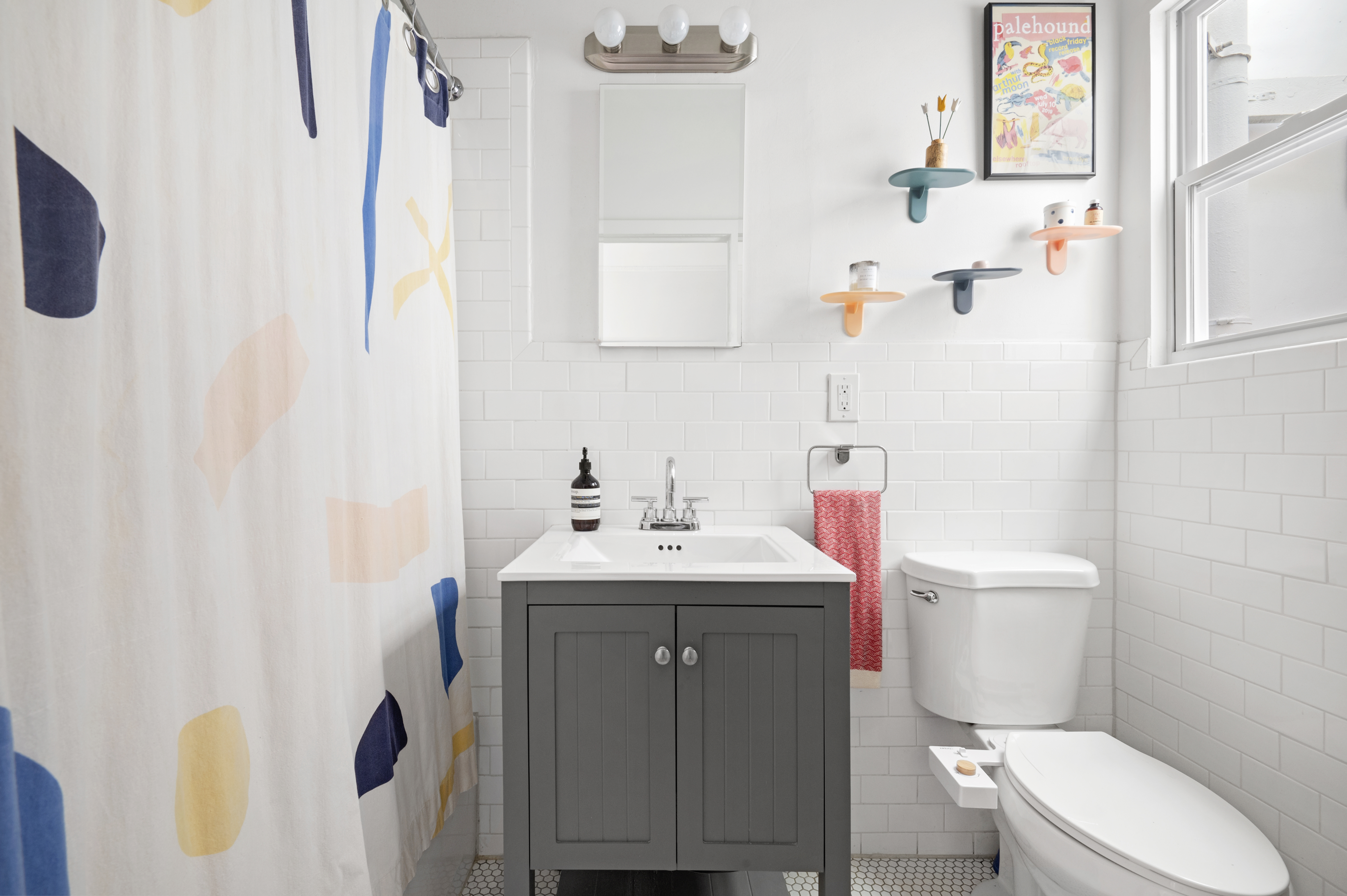185 East 31st Street Brooklyn, NY 11226 - Photo 20 of 23 a bathroom with a sink vanity mirror and toilet