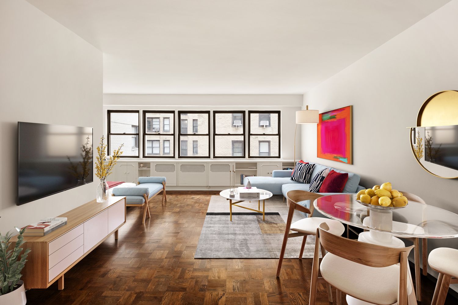 a living room with furniture and a flat screen tv