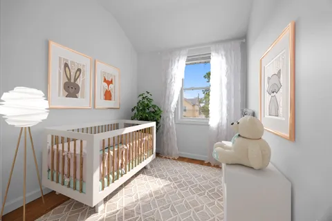 a bedroom with furniture and a window