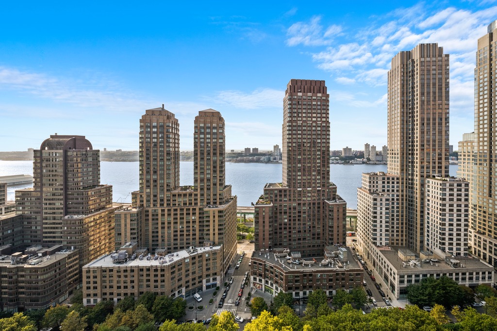 185 West End Avenue, Unit 11P Manhattan, NY 10023 - Photo 9 of 10 a view of a city with tall buildings